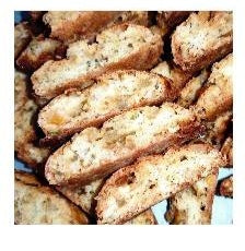 Cantucci con pistacchio, canditi e cioccolato bianco